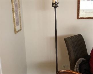 heavy metal torchiere with opalescent glass shade and side drink table with monkey image