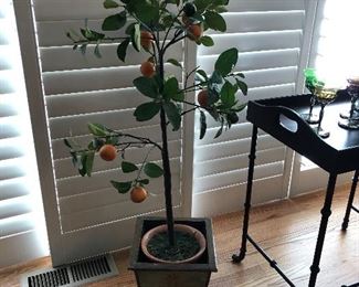 faux orange tree in painted pot