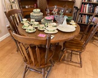 Maple table with 2 leaves and 6 chairs. Franciscan Ivy pottery