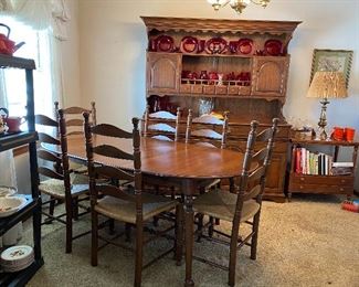 Can Purchase Early! Large Dinning Hutch Stunning! Wonderful Storage!  78" tall x 66' wide x 20" Deep (two pieces)                                                                                   Dinning Table with two Leafs 73" long (53" without Leafs) x 23" wide x 29" tall.  All Chairs are strong with Rush Seats. One has a stain that you may can clean out