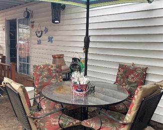 Bouncing Chairs wrought iron Patio Set Table, Chairs and Umbrella 