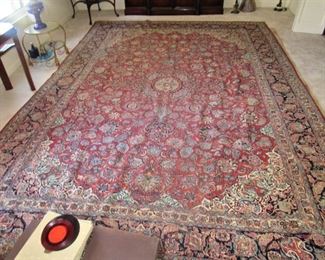 1. $950 Persian Area Rug, 105" x 147"