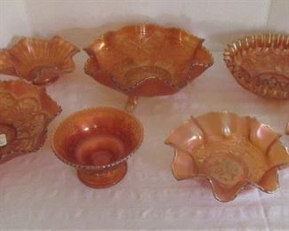11. $20-40 each  Marigold Carnival Glass Grouping