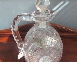 63. $50 Cut Crystal Decanter with pewter label