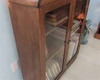 54. $195 Art Deco Bookcase, some wear to top finish, 36”w x 10.5”d x 43”h