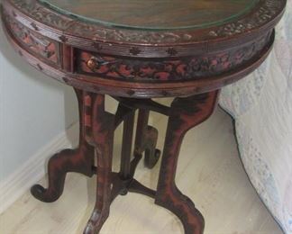 84. $295 Highly Carved Asian Table with swing out drawers, 30”h	