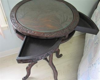 84. $295 Highly Carved Asian Table with swing out drawers, 30”h	