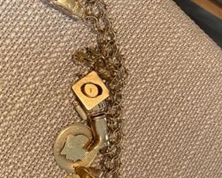 14kt Gold charm bracelet 48.29 grams or 1.7 ounces $1,450.00