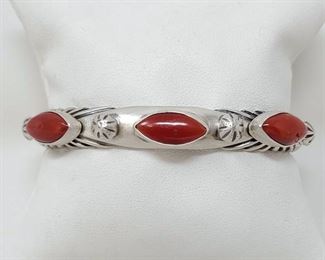 408	

Sterling Silver Cuff With Coral Stones, 48.4g
Weighs Approx 48.4g
Value 480