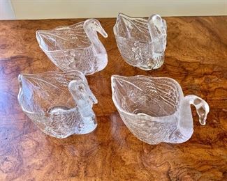 $20 - Set of 4 swan-shaped glass salt/sugar servers -  4" H, 5" W, 3" D. 