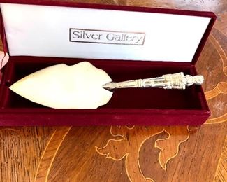 $25 Silver Gallery cake server with soldier handle.  11" L.  