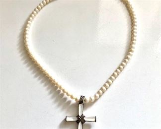 $30 Cross charm on pearl necklace.  17"L