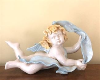 $50 - Porcelain angel holding ribbon.  7.5" H, 13" L,  5: D.