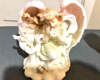 $20 Angel statue pastel colors.   5.5" H, 4.75" W, 3.5" D.