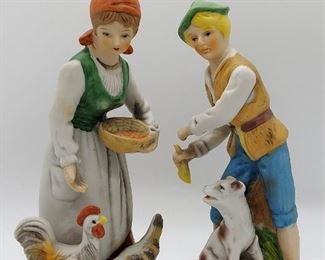 TWO FIGURINES