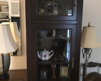 One of two tall display cabinets. $250 each or $500 pr