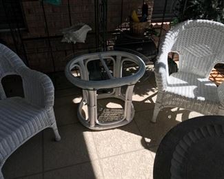 Pair of white wicker chairs $125 each 