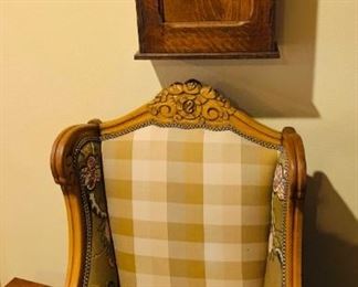On of a Kind Hand-carved Oak King Chair above Antique medicine shelf