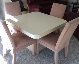 Lacquer game table with 4 upholstered high back chairs   