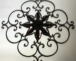 Iron Wall Decor with Floral Elements
