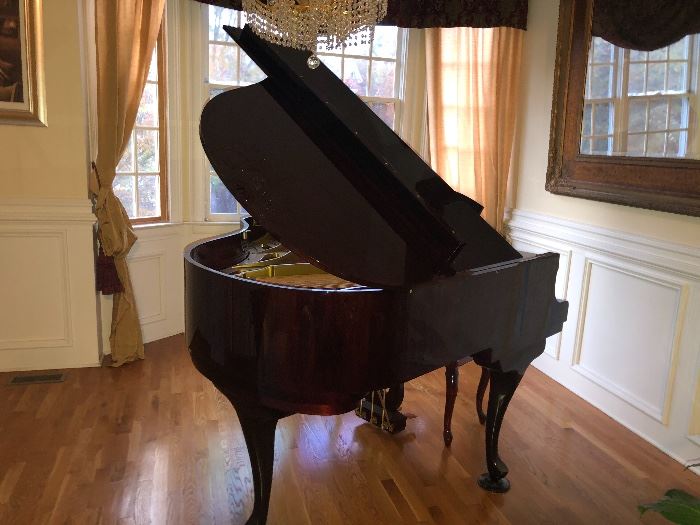 Beautiful Baby Grand Piano and Chandelier is for sale