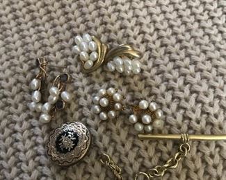 Large collection of gold and pearl earrings