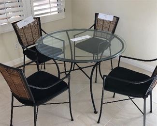 Glass and wrought iron table 4 chairs
