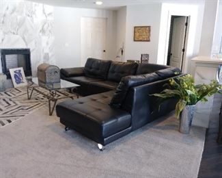 Black leather sectional sofa