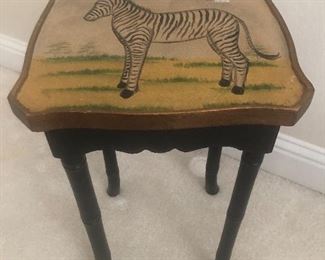 Another accent table with zebra painted on it,