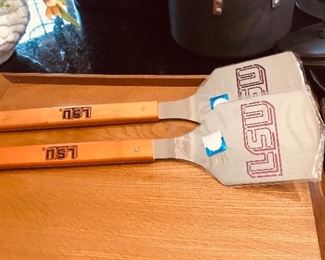 Cutting board with new LSU spatulas