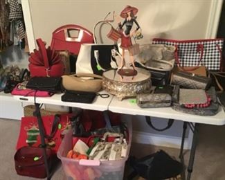 Lots of purses, shoes and clothes