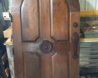 Spanish cedar round top entry door. Includes frame and all trim. Includes locking bolt w/key.  42” wide x 77.5” tall. 1 3/4” thick.