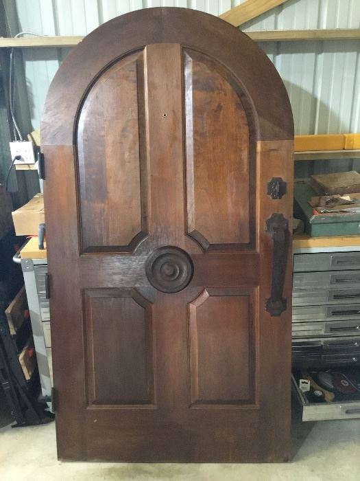 Spanish cedar round top entry door. Includes frame and all trim. Includes locking bolt w/key.  42” wide x 77.5” tall. 1 3/4” thick.