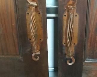 Ornate door handles.