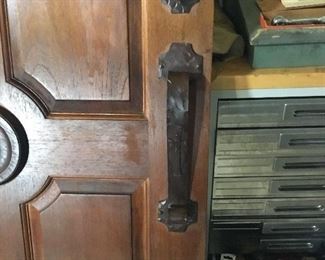 Ornate round door handles.