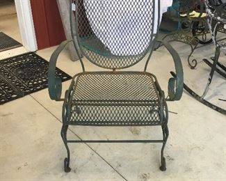 Wrought iron chairs. Matching pair.
