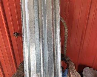 Galvanized storm window covers. About 16 covers