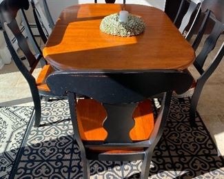 BLACK WITH NATURAL TOP!                                      REFRACTORY(HIDDEN LEAVES) FARM TABLE WITH 6 CHAIRS.