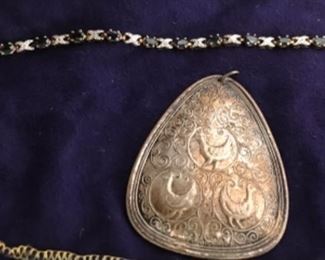 Sterling pendant, gold bracelet 