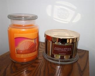 $15. Two unused scented candles.