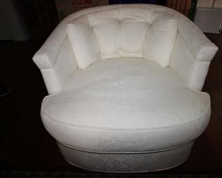 $50. White fabric swivel club chair.