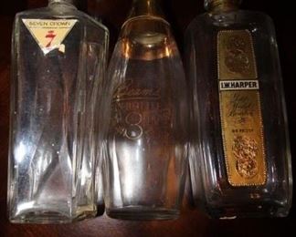 $15. Three vintage spirit bottles.