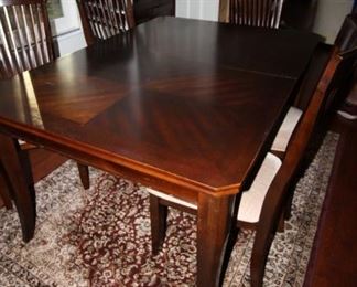 $400. Dining table and 6 chairs and extra leaf. 42x60           Extra leaf measures 18 inch.