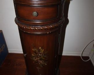 $60. faux marble top round cabinet. 33x14