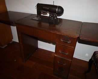$85. Antique/vintage Kenmore electric sewing machine in cabinet. 