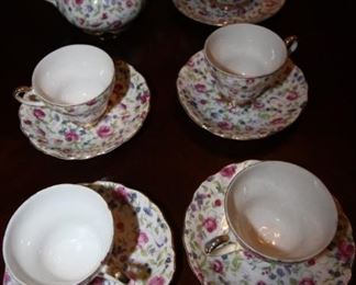 $50. Unmarked  set . 4 cups and saucers and cream and sugar set.