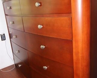 $375. Ten drawer cherry colored tall chest of drawers, 58x20x45.