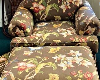 pair of club chairs with ottomans
