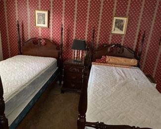 Twin cherry bedroom suite with mattresses,dresser,chest,2 beds and bedside table.