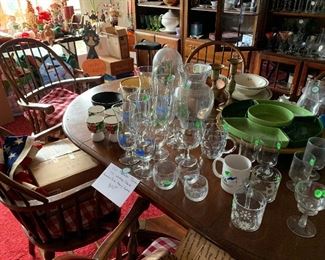 various glassware, outdoor serving pieces, chip and dip sets... American Drew cherry dining table and 6 Windsor chairs
